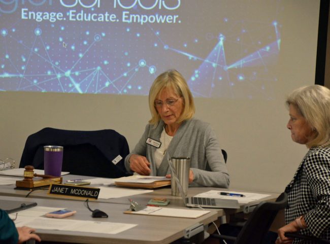 Engage. Educate. Empower. Fire: Janet McDonald, left, with School Board Attorney Kristy Gavin, who's been the in-house counsel since 2010. (© FlaglerLive)