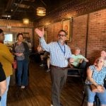 Palm Coast City Manager Mike McGlothlin this morning at his monthly Coffee with the Manager, in this case hosted by Jacked Up Bean in St. Joe's Plaza. (© FlaglerLive)