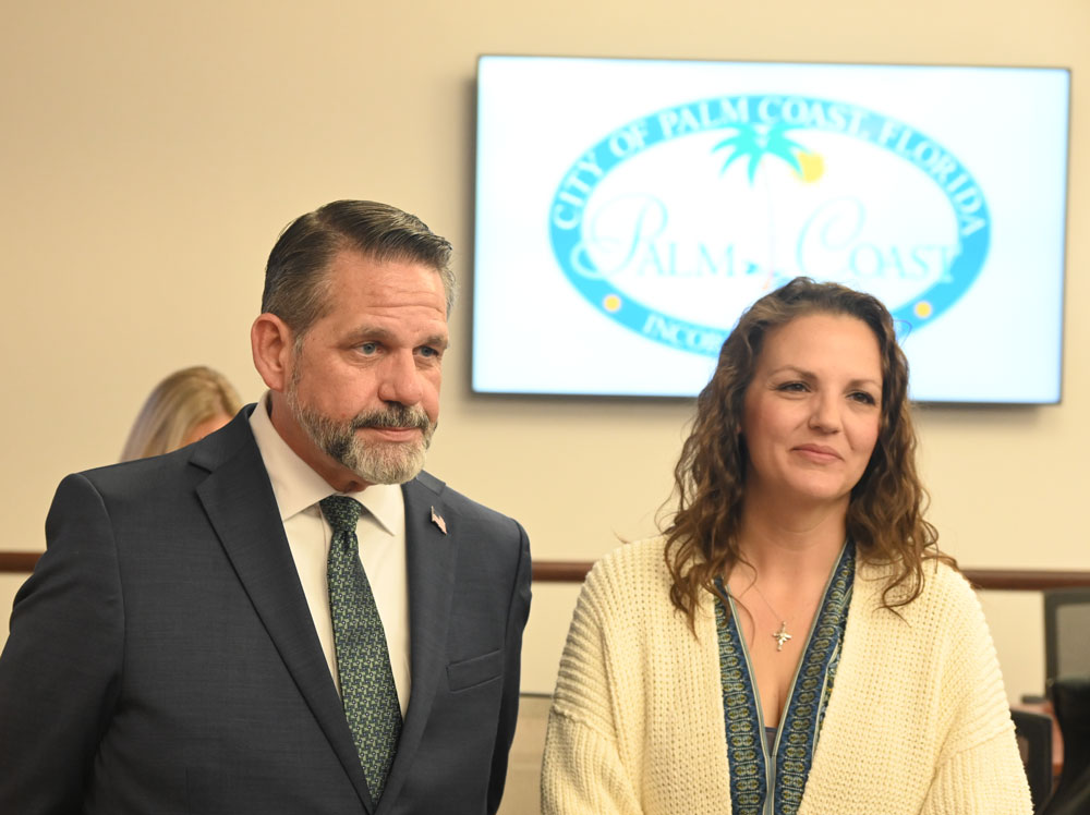 Jessica and Michael McGlothlin during a meet-and-greet at Palm Coast City Hall last week. (© FlaglerLive)