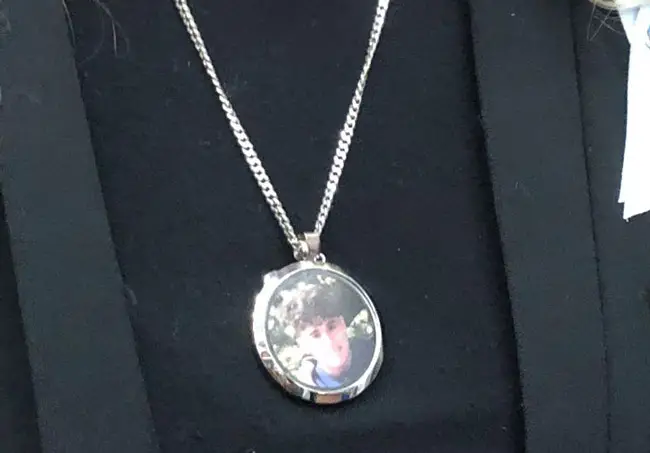 A medallion bearing the image of one of the students murdered in the Parkland school massacre in February. (NSF)