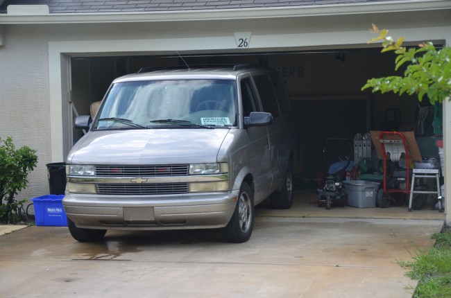 The Medical Examiner's van as it was receiving Lynn's body. Click on the image for larger view. (© FlaglerLive)