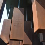 At the National Memorial for Peace and Justice in Alabama, some of the corten steel columns representing 800 counties in the United States where a racial terror lynching .took place. (© FlaglerLive)