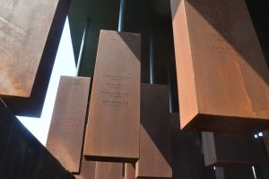 At the National Memorial for Peace and Justice in Alabama, some of the corten steel columns representing 800 counties in the United States where a racial terror lynching .took place. (© FlaglerLive)