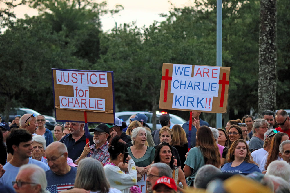 Throngs filled the plaza and parking lot of the Flagler County Courthouse Wednesday evening for a vigil in memory of Charlie Kirk. (© Eryn Harris)