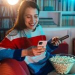 Using multiple digital devices at once can be highly distracting and overstimulating. Riska/E+ via Getty Images
