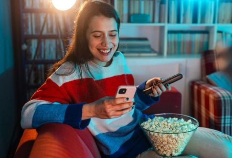 Using multiple digital devices at once can be highly distracting and overstimulating. Riska/E+ via Getty Images