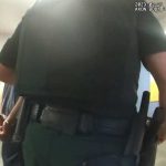 The student as he was being escorted out of the school by a Flagler County Sheriff's deputy Tuesday morning, in a still from a body camera.