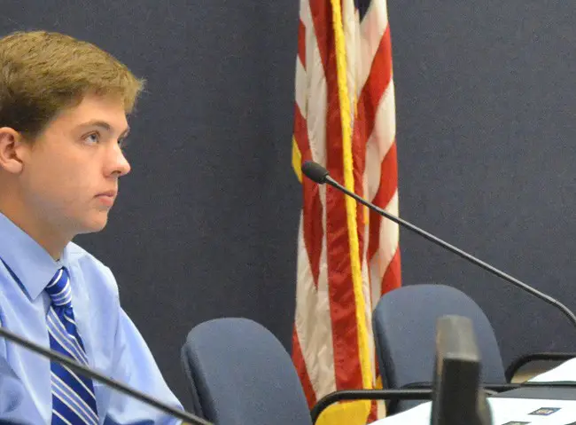 Michael Manning, a senior at Matanzas High School, acts entirely in his element when challenging board members and school administration as the district's student representative. (© FlaglerLive)