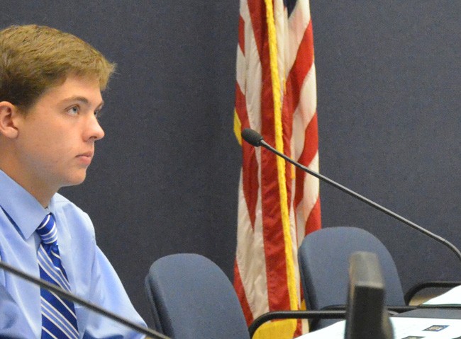 Michael Manning, a senior at Matanzas High School, acts entirely in his element when challenging board members and school administration as the district's student representative. (© FlaglerLive)