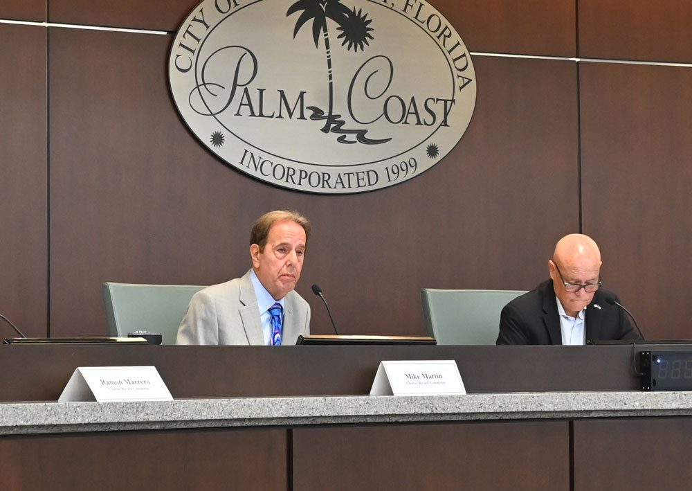 The Charter Review Committee's Michael Marin, left, and chair Donald O'Brien at the committee's first meeting last week. Had Martin not intervened, the next meeting of the committee may not have taken place until January, which a council member found "unacceptable." (© FlaglerLive)