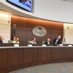 From left, Patrick Miller, Ramon Marrero, Michael Martin, Donald O'Brien, and Perry Mitrano, setting O'Brien's name in front of him after O'Brien was named chair. (© FlaglerLive)