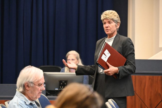 Superintendent Cathy Mittlestadt addressing the audience Monday. (© FlaglerLive)