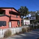 The Flagler County Commission granted the future Modern Mexx restaurant in the Hammock an exception to have fewer parking spaces than required, knowing it will be using the parking lot of Debra Jean's Cafe nearby. (© FlaglerLive)