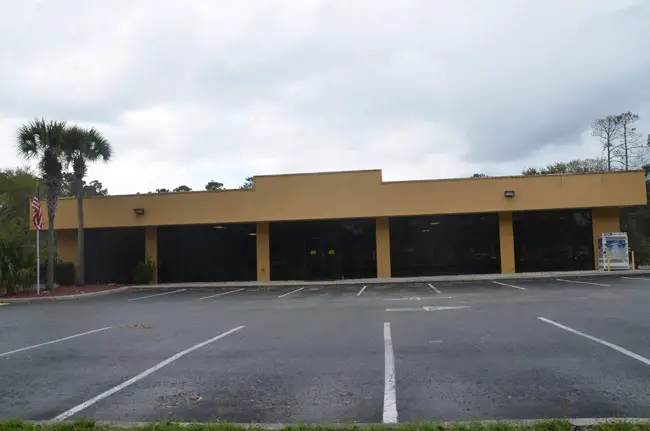 The Sears building on Palm Coast Parkway. The county was planning to turn it over to the sheriff. (© FlaglerLive)