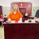 Mollie Hayes, left, with her attorney, Keith Teifke, during her sentencing this morning. (© FlaglerLive via zoom)