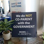 Signs in the hallway during the inaugural Moms For Liberty Summit on July 15, 2022, in Tampa, Fla. (Octavio Jones/Getty Images)