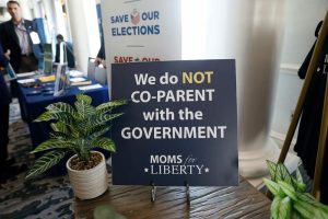 Signs in the hallway during the inaugural Moms For Liberty Summit on July 15, 2022, in Tampa, Fla. (Octavio Jones/Getty Images)