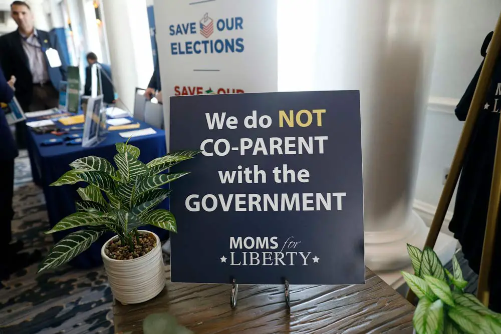 Signs in the hallway during the inaugural Moms For Liberty Summit on July 15, 2022, in Tampa, Fla. (Octavio Jones/Getty Images)