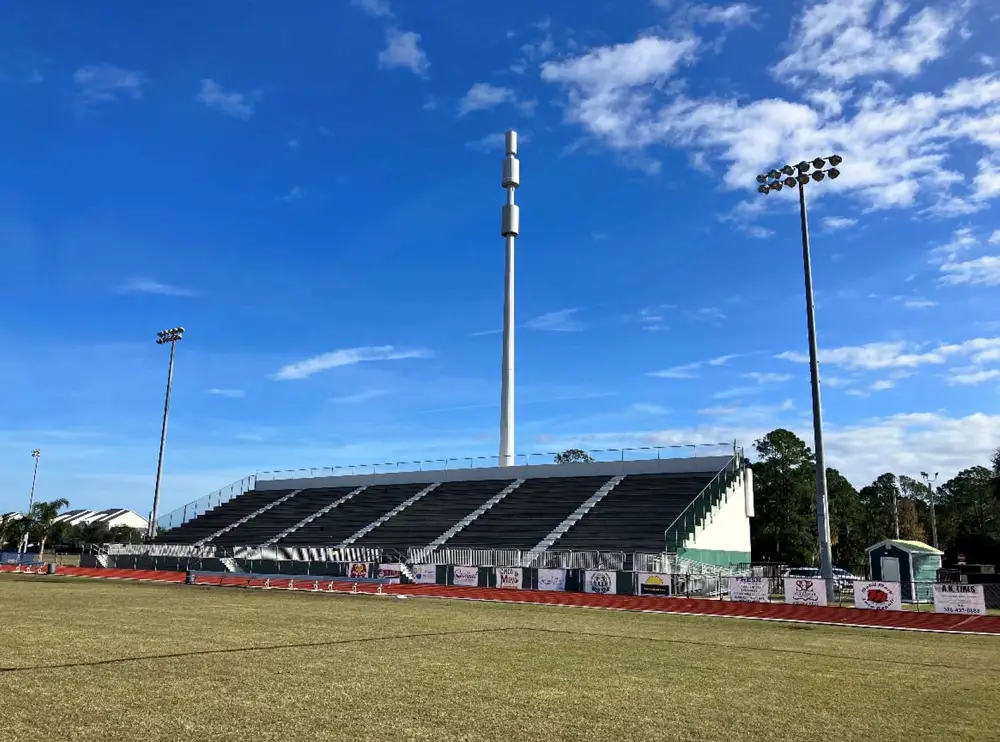 The School Board's cell tower, leasing space to two carriers, just behind the football field at Flagler Palm Coast High School. 
