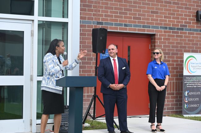 From left, Superintendent LaShakia Moore, Board Chair Will Furry, and Matanzas Principal Kristin Bozeman. (© FlaglerLive)