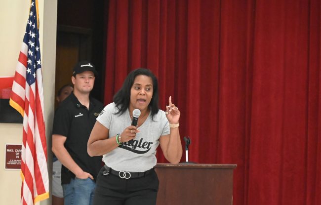 Superintendent LaShakia Moore can upstage even a NASCAR star. (© FlaglerLive)
