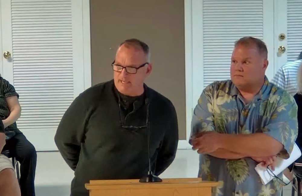 Realtor John Horan, left, and Matt Morton, pitching the idea of a privately-owned website that would be a portal of public, city information. The Flagler Beach City Commission, hearing the proposal at a workshop Thursday, rejected it in favor of in-house products. (© FlaglerLive via Flagler Beach video)
