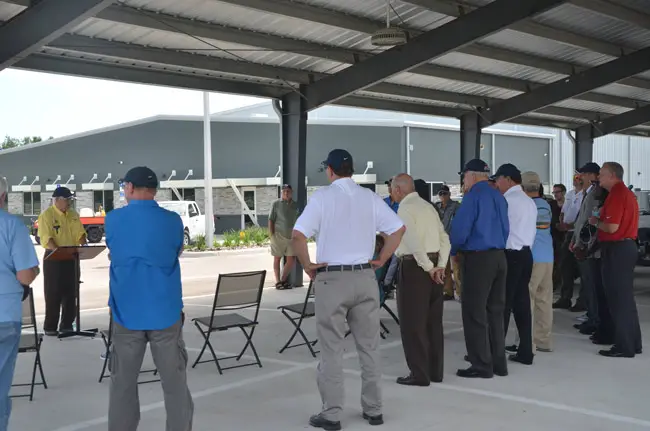 Jules Kwiatkowski, chairman of the three-member, elected Mosquito Control Board, addresses officials before the ribbon-cutting at the district's $2.1 million new headquarters last June. Kwiatkowski said he was unaware of any financial problems. (© FlaglerLive)