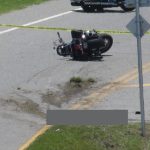 The crash scene on State Road A1A on Thursday afternoon. The victim--blocked out--remained at the scene until the medical examiner claimed the body in mid-afternoon. (© Bob Ziolkowski for FlaglerLive)