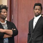 Kwentel Moultrie with his attorney, Assistant Public Defender Regina Nunnally, moments before the verdict was read. (© FlaglerLive)