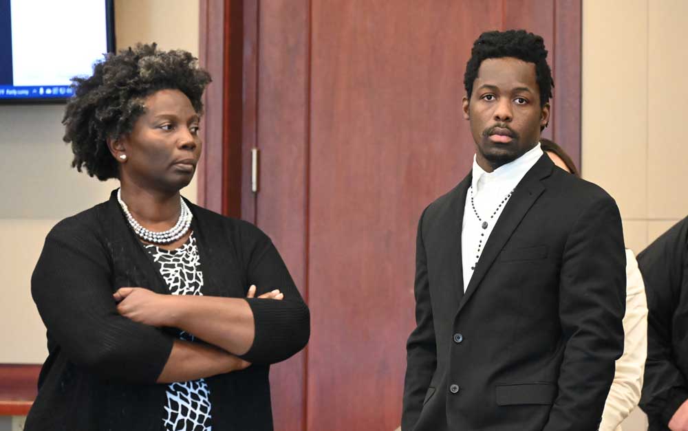 Kwentel Moultrie with his attorney, Assistant Public Defender Regina Nunnally, moments before the verdict was read. (© FlaglerLive)