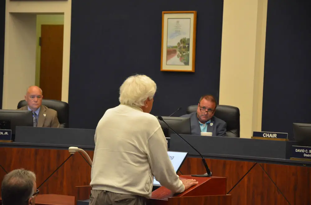 Mike Cocciola, a Democratic Party leader, implored the commission to focus on Flagler-related issues at the beginning of today's meeting. (© FlaglerLive)