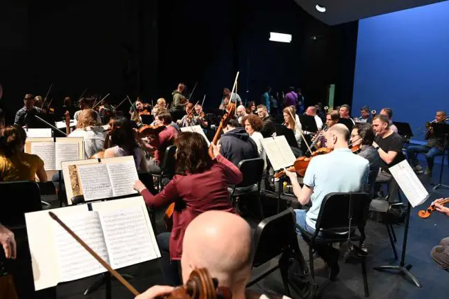 The 68-piece orchestra settled in quickly for the rehearsal, after spending the previous 36 hours traveling from Lviv to Warsaw to Miami to Palm Coast. (© FlaglerLive)
