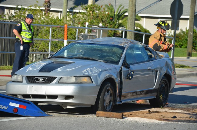 The Mustang after Roger's Towing righted it. Click on the image for larger view. (© FlaglerLive)
