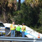The Cessna that crashed on I-95 this afternoon rolled over into the shoulder on the side of the highway. It is is registered to a Port Orange owner. (© FlaglerLive)