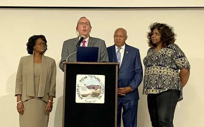 Palm Coast Mayor David Alfin, second from left, read a city proclamation recognizing the Flagler County Branch of the NAACP at its Freedom Fund Awards Luncheon. Joining him on at the podium were, from left Flagler County NAACP First Vice President Phyllis Pearson, President Shelley Ragsdale and Second Vice President Blanche Valentine. (© FlaglerLive)