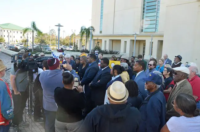What was billed as a 'news conference' by the NAACP regarding the case of two students' racist threats toward a black teacher, held this afternoon in front of the county courthouse, trended more toward grandstanding statements and allegations rather than revelations, with the exception of brief statements by the threatened teacher herself. (c FlaglerLive)