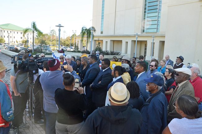 What was billed as a 'news conference' by the NAACP regarding the case of two students' racist threats toward a black teacher, held this afternoon in front of the county courthouse, trended more toward grandstanding statements and allegations rather than revelations, with the exception of brief statements by the threatened teacher herself. (c FlaglerLive)