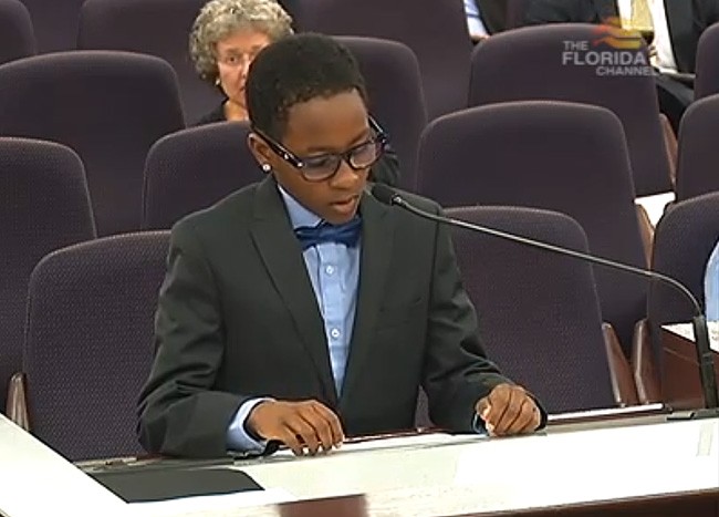 10-year-old Nathan Gill addressing the Senate Rules Committee about his two dads on Monday just before he was cut off by Committee Vice Chair Darren Soto, the Kissimmee Democrat. (Florida Channel)