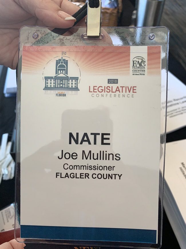 Newly-elected  Flagler County Commissioner Joe Mullins is attending the Florida Association of Counties' Legislative Conference in Tampa this week. But he had a surprise when he went to pick up his name badge: organizers had his name in second billing, below 'Nate,' former Commissioner Nate McLaughlin, whom Mullins defeated. 'I just can't win,' Mullins joked in a text. 'You think someone is trying to set me off.' He added: 'Things like this don;t bother me, they make for funny stories.' On Tuesday, he'd been attending a seminar on ethics, public records and Sunshine laws.