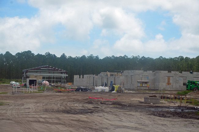 Work is progressing on the $22 million, 76,708 square foot Army Readiness Center at the south end of the Flagler County airport. (© FlaglerLive)