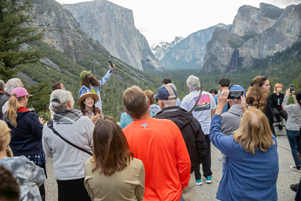 Crowds often form at popular places in U.S. national parks, like the entrance to Yosemite Valley in California.