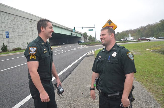 Flagler County Sheriff's deputy Richard Petkovsek, right, and Sgt. Jason Neat at the scene of the crash on Jan. 2, 2016. (© FlaglerLive)