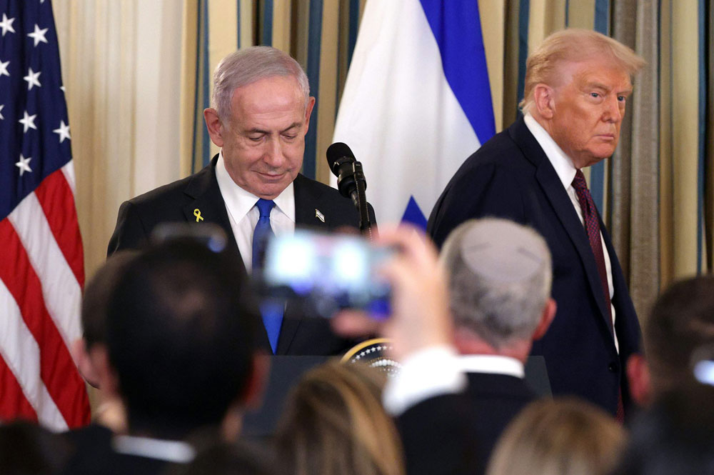 U.S. President Donald Trump and Israeli Prime Minister Benjamin Netanyahu arrive for a joint news conference at the White House on Sept. 29, 2025.