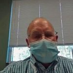 Flagler Health Department Director Bob Snyder in face mask, addressing the Palm Coast City Council during a virtual meeting last week. (© FlaglerLive via YouTube)