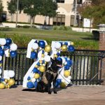 Michelle Young and her dog Nitro memorialize the occasion. (© FlaglerLive)