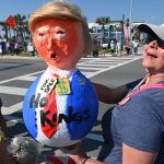 In Flagler Beach today, Donald Trump was given a new look by a No Kings protester. (© FlaglerLive)