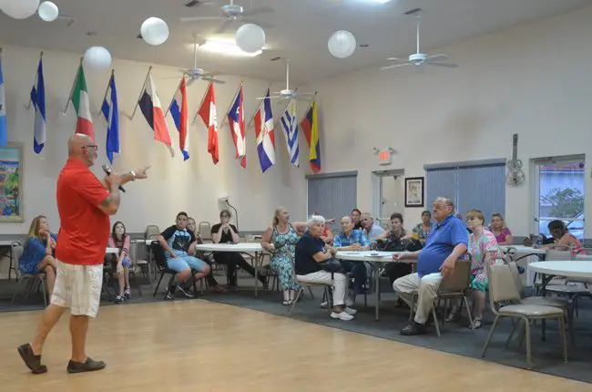 A community meeting intended to discuss opposition to a planned path in the F-Section turned into a grilling of Palm Coast City Council member Steven Nobile. Council member Heidi Shipley also attended the meeting. (c FlaglerLive)