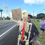 A protester on No Kings Day in palm Coast on Oct. 18. (© FlaglerLive)