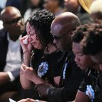 The family of Nolan Wells, during a July 20, 2026, service in Ocean Springs, Miss., for the 18-year-old found dead after taking a July 4 boat trip with friends.