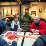 In Detroit, Mich., volunteers with the Detroit People’s Assembly put together whistle kits designed to alert the community when immigration agents are nearby. Jim West/UCG/Universal Images Group via Getty Images